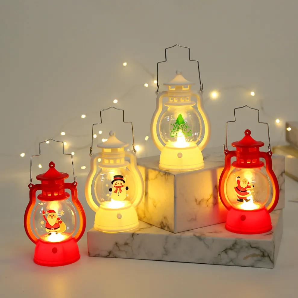 Set of Christmas Decorative LED Lantern Lamp with Christmas-themed figures on a marble base.