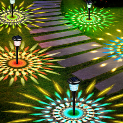Decorative LED Garden Lights casting colorful patterns on a pathway