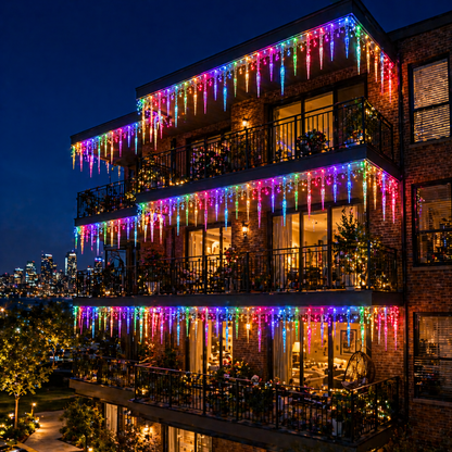 Multicolored LED Icicle Christmas Lights Outdoor on a building at night with city skyline in the background