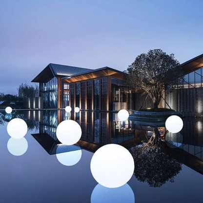 Modern building by a pool with Modern LED Orb Lights Outdoor at night
