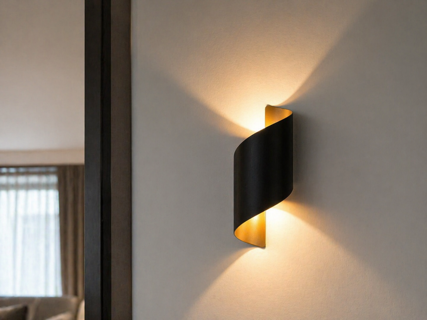 Modern Up Down Wall Lamp on a gray wall with a window in the background.