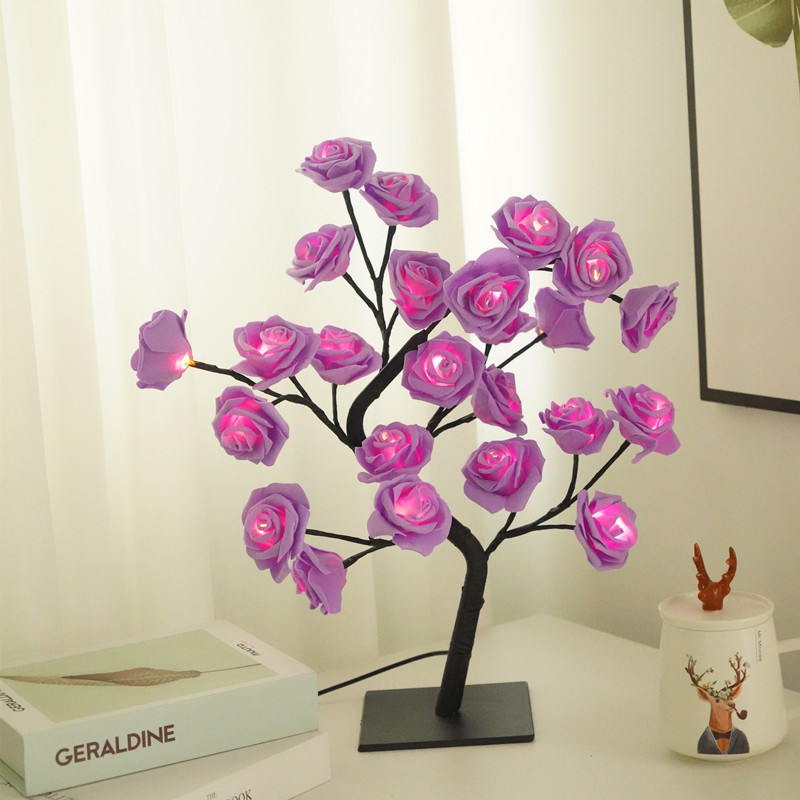 Rose Tree LED Table Lamp with purple flowers on a white surface.