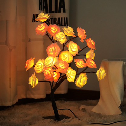Rose Tree LED Table Lamp with illuminated flowers in a room setting.