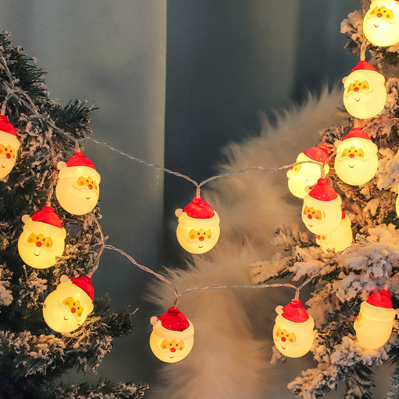 Santa Claus LED String Lights  with Santa Claus faces on a Christmas tree.