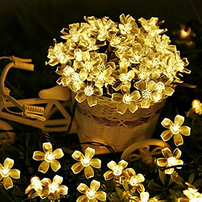 Solar Flower Fairy String Lights in a basket with a dark background