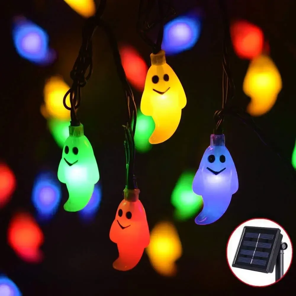 Solar LED Ghost String Lights with colorful ghost and pumpkin designs on a dark background