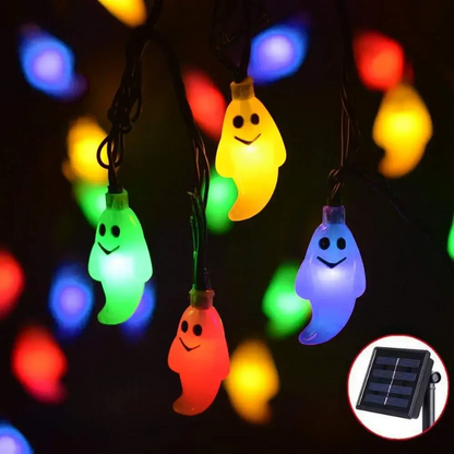 Solar LED Ghost String Lights with colorful ghost and pumpkin designs on a dark background