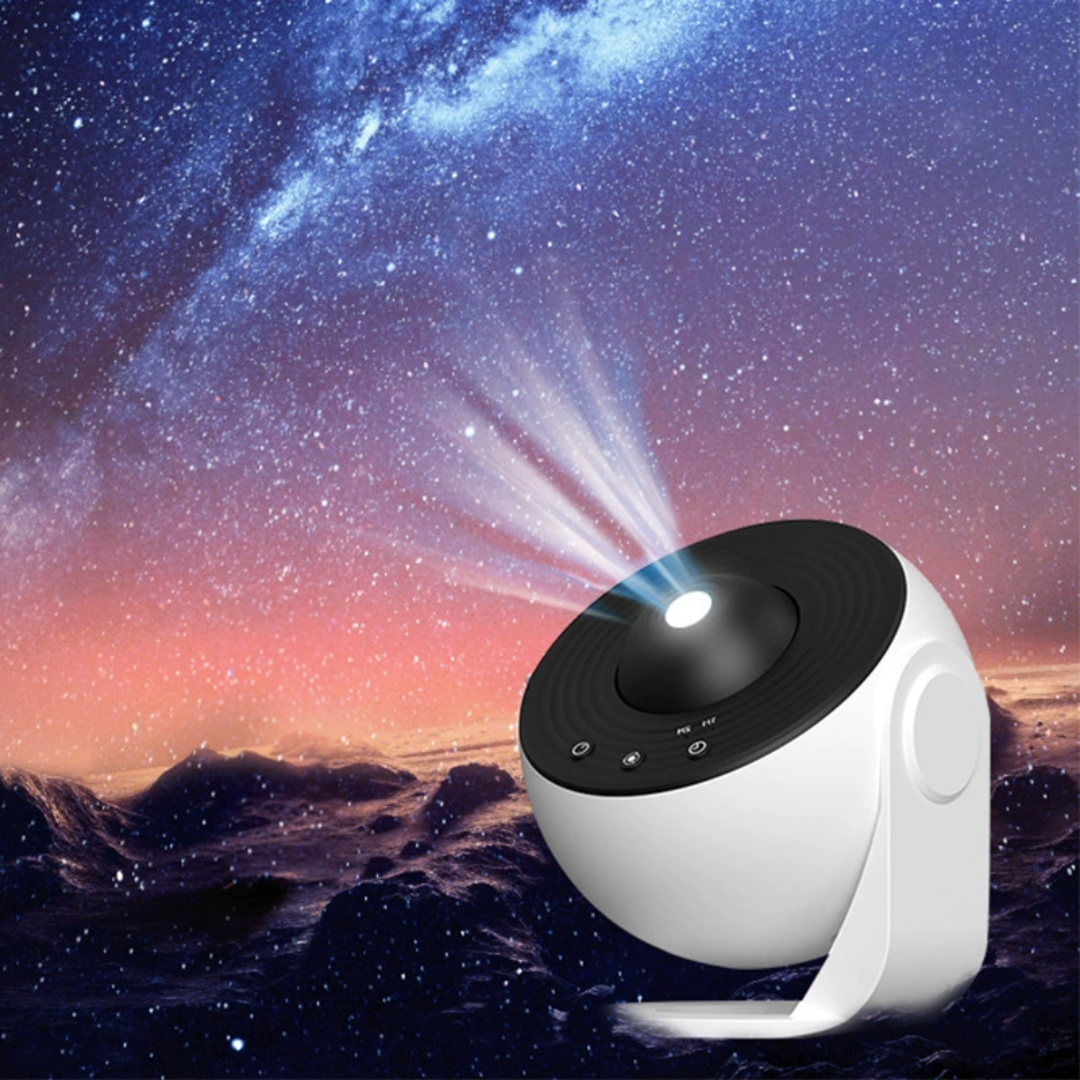Starry Sky Galaxy Projector Lamp projecting stars onto a night sky with mountains in the background